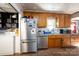 Well-lit kitchen featuring stainless steel appliances, and wood-look flooring at 121 C And C Ln, Mooresville, NC 28115