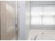 Bathroom featuring a large tub with shower at 12321 Aquitaine St, Charlotte, NC 28277