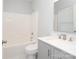 Well-lit bathroom with a shower and vanity at 12321 Aquitaine St, Charlotte, NC 28277