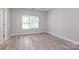 Bedroom with modern flooring and large window at 12321 Aquitaine St, Charlotte, NC 28277