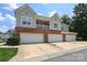 Spacious townhome with a multi-car garage and a second-story balcony at 12321 Aquitaine St, Charlotte, NC 28277
