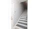 Grey and white stairway leading to upper level at 12321 Aquitaine St, Charlotte, NC 28277