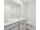 Bathroom featuring a double vanity, tiled floors, and modern fixtures; a clean and efficient space at 142 Satchel Ct, Mooresville, NC 28115