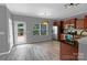 Open-concept kitchen with updated appliances and a view of the backyard at 1548 Logan Patrick Ct, Gastonia, NC 28052