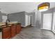 Eat-in kitchen featuring dark wood cabinetry and an inviting breakfast bar at 1548 Logan Patrick Ct, Gastonia, NC 28052