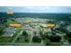 Aerial view of the neighborhood amenities including community pool, tennis courts, and community golf course at 172 Hunters Hill Dr, Statesville, NC 28677