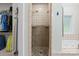 Modern bathroom with a tiled walk-in shower and adjacent soaking tub at 172 Hunters Hill Dr, Statesville, NC 28677