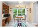 Breakfast nook with a round table, two chairs, and a large window with tree views at 172 Hunters Hill Dr, Statesville, NC 28677