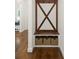 Hallway featuring a mud room bench with storage baskets and hooks, perfect for organization at 174 Bellingshire Dr, Mt Ulla, NC 28125