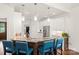 Kitchen with a wooden breakfast bar, granite countertops, stainless steel refrigerator, and barstool seating at 174 Bellingshire Dr, Mt Ulla, NC 28125