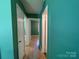 Hallway showcasing easy access to multiple rooms at 1824 Maribel Ave, Charlotte, NC 28216