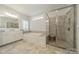 Spa-like bathroom with a separate shower, soaking tub, and tiled accents at 2004 Viscount Dr, Matthews, NC 28104
