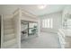 Charming bedroom with a built-in bed loft, desk and ample lighting at 2004 Viscount Dr, Matthews, NC 28104