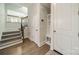 A hallway and foyer combination with hardwood floors and ample closet space at 2004 Viscount Dr, Matthews, NC 28104