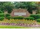 Attractive brick Brookhaven neighborhood sign surrounded by colorful landscaping and lush greenery at 2004 Viscount Dr, Matthews, NC 28104