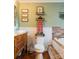 Bathroom featuring a vanity with drawers, a mirror, decor, a toilet, and a tub at 24007 Old Aquadale Rd, Albemarle, NC 28001