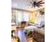 Cozy living room with hardwood floors, soft lighting, and comfortable seating at 24007 Old Aquadale Rd, Albemarle, NC 28001