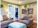 Comfortable living room with hardwood floors, soft lighting, and cozy seating arrangement at 24007 Old Aquadale Rd, Albemarle, NC 28001
