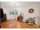 Bright bedroom featuring hardwood floors, vintage decor and natural light from windows at 2500 Kendrick Dr, Charlotte, NC 28214