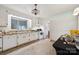 Functional kitchen with white cabinets and appliances, ready for your culinary touch at 2500 Kendrick Dr, Charlotte, NC 28214