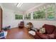 A bright sitting area with large windows providing backyard views at 2500 Kendrick Dr, Charlotte, NC 28214
