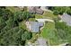 An aerial view showcasing the home's landscaped yard, fire pit area, and inviting outdoor spaces at 2590 Berne Ln, Sherrills Ford, NC 28673