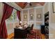 Cozy home office with classic décor, built-in shelving, and ample natural light at 2590 Berne Ln, Sherrills Ford, NC 28673
