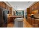 Well-equipped kitchen with stainless appliances, granite counters, and a central island for food preparation at 2590 Berne Ln, Sherrills Ford, NC 28673