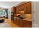 Modern kitchen with stainless steel appliances, gas cooktop, and abundant cabinet space for storage solutions at 2590 Berne Ln, Sherrills Ford, NC 28673