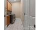 Functional laundry room with modern washer and dryer units plus built-in cabinetry at 2590 Berne Ln, Sherrills Ford, NC 28673