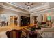 Spacious living room with hardwood floors, tray ceiling, and seamless flow to dining and kitchen at 2590 Berne Ln, Sherrills Ford, NC 28673
