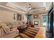 Bright living room features hardwood floors, fireplace, and an open doorway to outdoor area at 2590 Berne Ln, Sherrills Ford, NC 28673