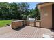 A built-in outdoor grill with a stone countertop and stainless steel appliances, perfect for outdoor cooking at 2590 Berne Ln, Sherrills Ford, NC 28673