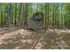 Whimsical treehouse nestled among the trees, offering a fun and adventurous escape for children and adults alike at 2590 Berne Ln, Sherrills Ford, NC 28673