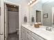 Bathroom featuring a double sink vanity with grey tile flooring, and modern fixtures at 314 Candella Dr, Matthews, NC 28104