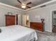Bright main bedroom featuring carpet floors and ensuite bathroom and walk-in closet at 314 Candella Dr, Matthews, NC 28104