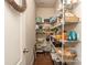 Pantry featuring wire shelving stocked with an array of food items and supplies at 314 Candella Dr, Matthews, NC 28104