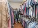 Large walk-in closet with custom shelving and ample storage space for clothing and accessories at 314 Candella Dr, Matthews, NC 28104