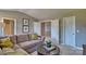 Cozy living room showcasing neutral colors, a comfortable sectional couch, and artwork at 3674 Charles Nw St, Conover, NC 28613