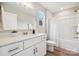 Well-lit bathroom with a vanity, mirror, and a shower-tub combo at 384 Speedway Pl, Concord, NC 28027