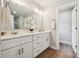 Bright bathroom features double vanity with granite countertops and modern fixtures at 384 Speedway Pl, Concord, NC 28027