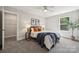 Bedroom with a walk-in closet and a window offering a view of the outdoors at 384 Speedway Pl, Concord, NC 28027