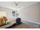 Bedroom with a neutral color scheme, a ceiling fan, and soft carpet at 384 Speedway Pl, Concord, NC 28027