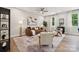 Spacious living room featuring a comfortable sofa, stylish furniture, and plenty of natural light at 384 Speedway Pl, Concord, NC 28027