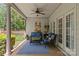Inviting back porch with comfortable seating, perfect for enjoying the outdoors and relaxing at 4025 Cherrybrook Dr, Mint Hill, NC 28227