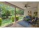 Relaxing outdoor living space with comfortable seating and lush greenery, perfect for enjoying the backyard at 4025 Cherrybrook Dr, Mint Hill, NC 28227
