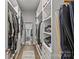 Spacious walk-in closet with custom shelving and ample storage space for clothes and accessories at 4025 Cherrybrook Dr, Mint Hill, NC 28227