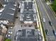 Aerial view of a community highlighting rooftop terraces, modern architecture, and street views at 4121 Selwyn Walk Ct, Charlotte, NC 28209