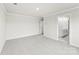 Well-lit bedroom with neutral carpeting and an attached bathroom for added convenience at 415 Luna Ln, Shelby, NC 28152