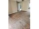Empty living room featuring hardwood floors with an adjacent room and doorway at 423 Tot Dellinger Rd, Cherryville, NC 28021